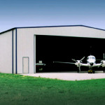 Steel airplane hangar building with airplane