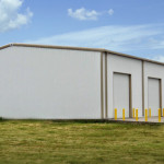Industrial white steel building with garage doors
