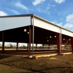 Covered horseback riding arena with skirt