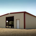Tan and red steel equipment storage building