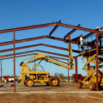 Red steel framing under construction