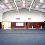 Interior of martial arts facility with blue carpet
