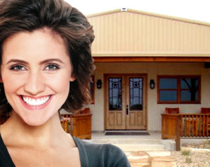 Smiling woman in front of her tricked out backyard getaway.