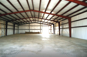 Photo of the interior of a newly finished RHINO metal building.