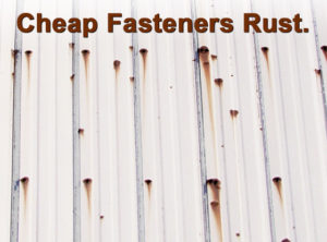 photo of metal building with unsightly rust caused by cheap screws.