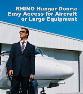 Businessman stands before a private jet and a steel aircraft hangar with the heading: "RHINO Hangar Doors."