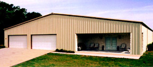 A RHINO Steel Building used a s a home, with a covered patio and a double garage