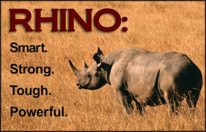 A black rhino stands gazing across the grass with the headline "RHINO: Smart. Strong. Tough. Powerful."
