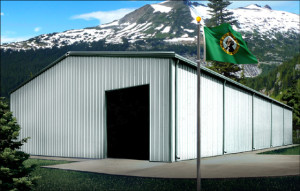 White metal building with dark green trim sit before a rugged snow-topped mountain in Washington state