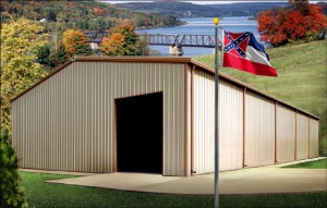 Metal building pictures before river in fall with Mississippi flag flying in the foreground