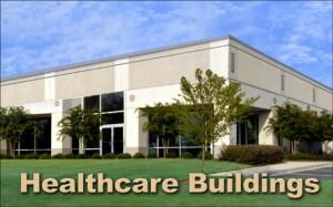 Photo of a single-story office building with a stucco exteriors and the caption "Healthcare Buildings"