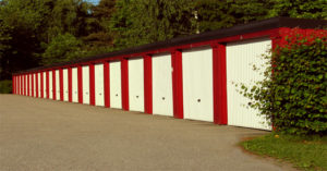 A row of red and brown self-storage units.