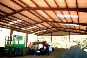 Photo of an open-sided RHINO farm shelter.