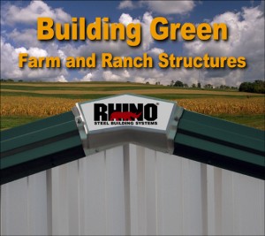 Closeup of the RHINO logo mounted on a metal building peak with hay fields in the background