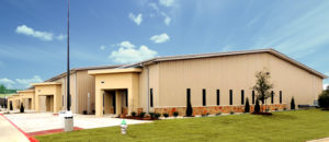 Photo of a line of upscale RHINO warehouses with stone trim.