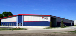 Photo of a RHINO red, white, and blue industrial metal building.