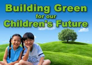 Two adorable children sit smiling in foreground of lovely green meadow with text "Building Green for Our Children's Future"