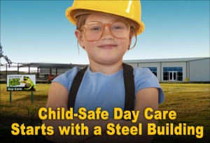 Little girl with glasses wears a big smile and a yellow hard hat as she stands before a steel building day care center unders construction