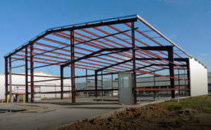 Photo of a RHINO pre-engineered metal building under construction.