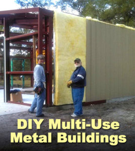 two men applying insulation to a multi-use steel building