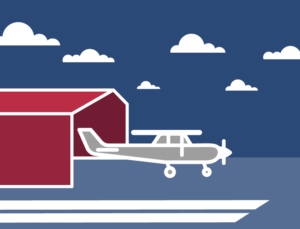 Icon of private plane near a metal airplane hangar.