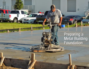 Photo of a man smoothing the concrete on a metal building foundation.