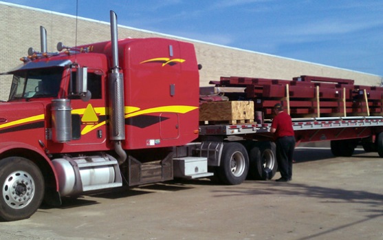 Truck delivering steel package