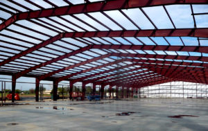 Photo of the framing of a RHINO steel industrial warehouse under construction.