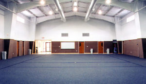 Photo of the interior of a large rec room.